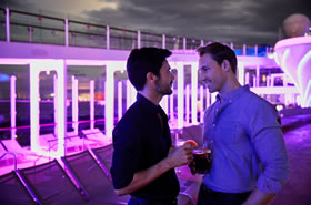 Celebrity Edge gay cruise pool nighttime